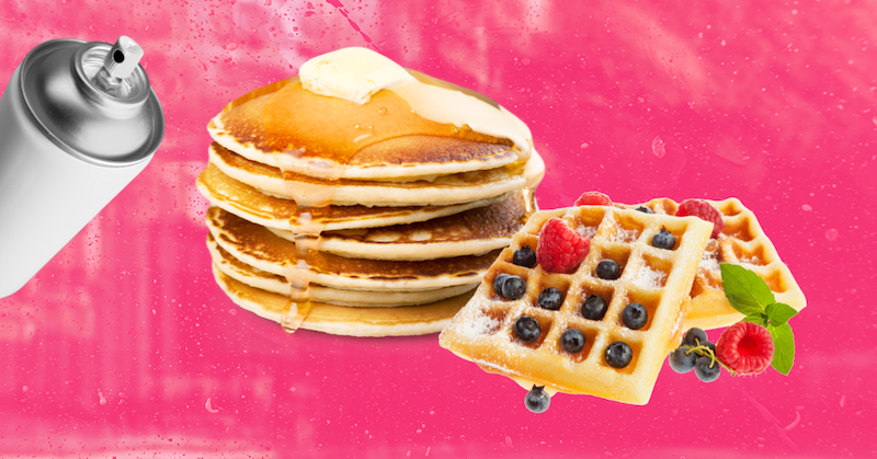 A spray can, pancakes, and waffles against a pink background.