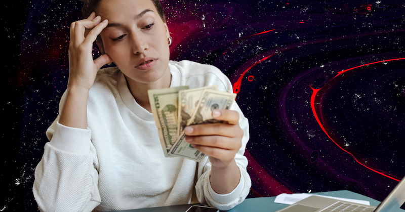 A stressed woman looks at a pile of cash in her hand against a red and black background.