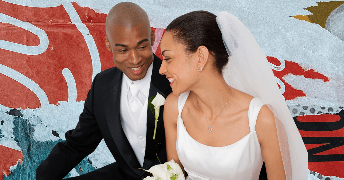 A bride and groom smiling at each other.