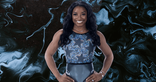 Simone Biles models a GK Elite gymnastics leotard.